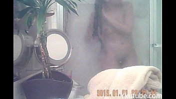 spying girl singing in shower